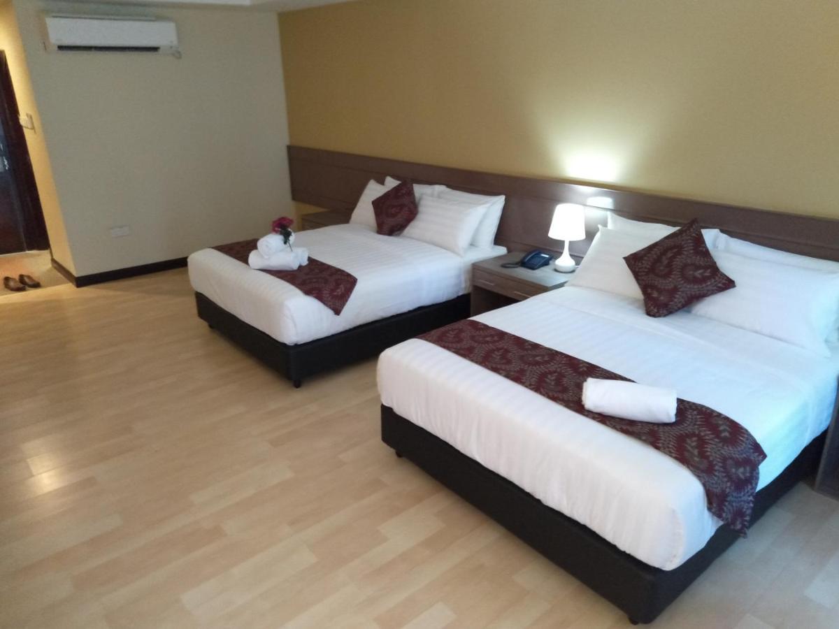 Temu Primula Hotel Kampong Seberang Timor Kültér fotó